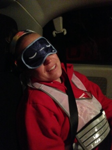 Colleen sporting a sleep mask with her reflective vest.  There was no sleep to be had in the van though, unfortunately.